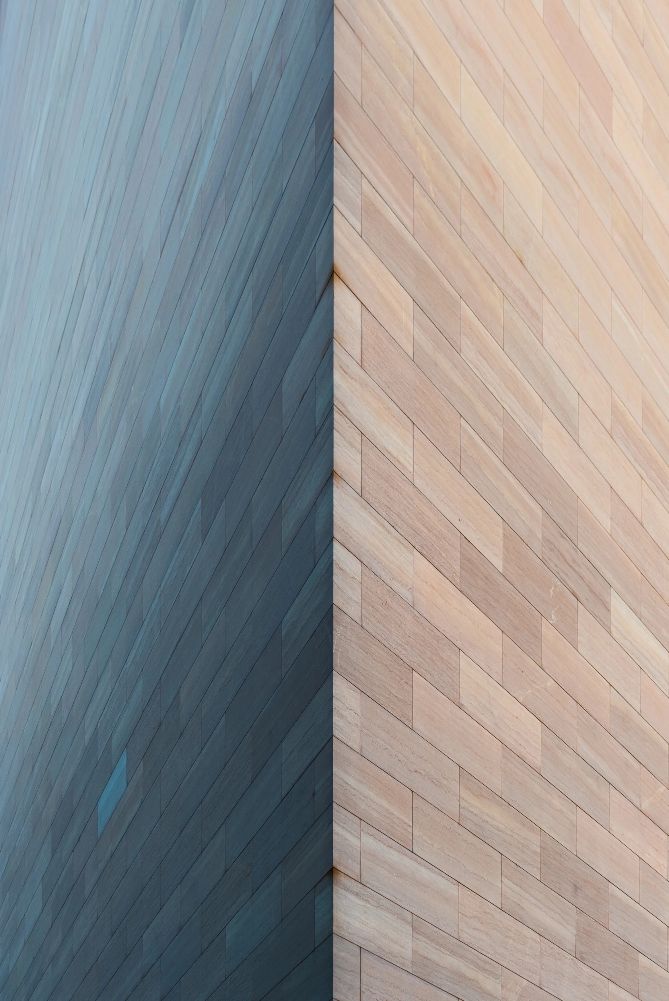 The corner of a building, showcasing its geometric shape